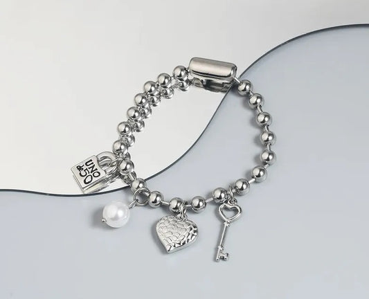 Pulsera de llave y corazón