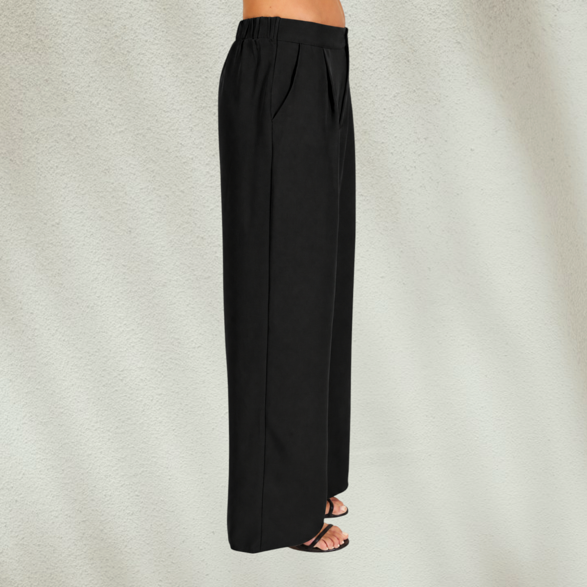 Purple Lola's Block black high-waisted wide-leg trousers with side pockets and elastic back waistband