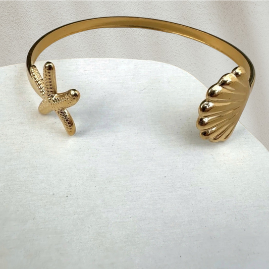 Brazalete de estrella de mar y concha